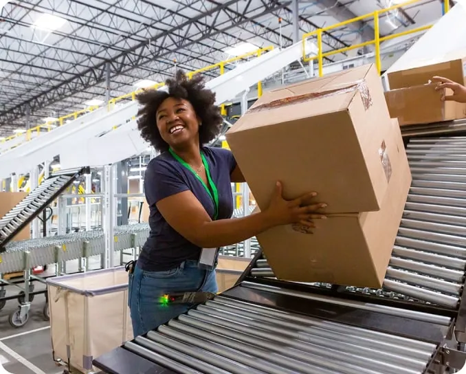 photo of worker moving boxes