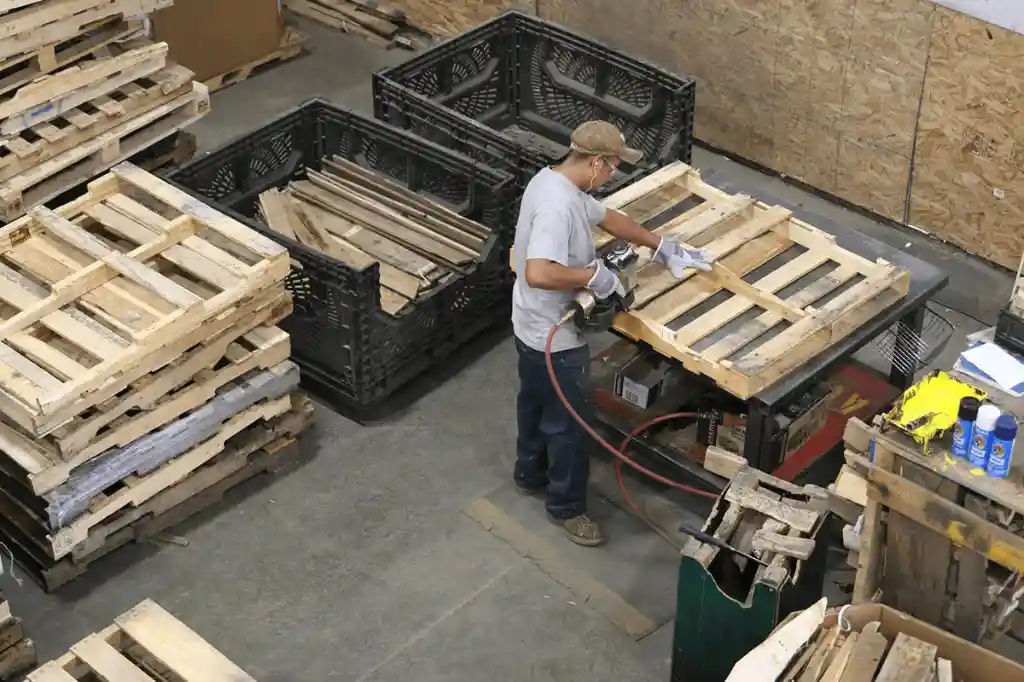 photo of person working on pallet